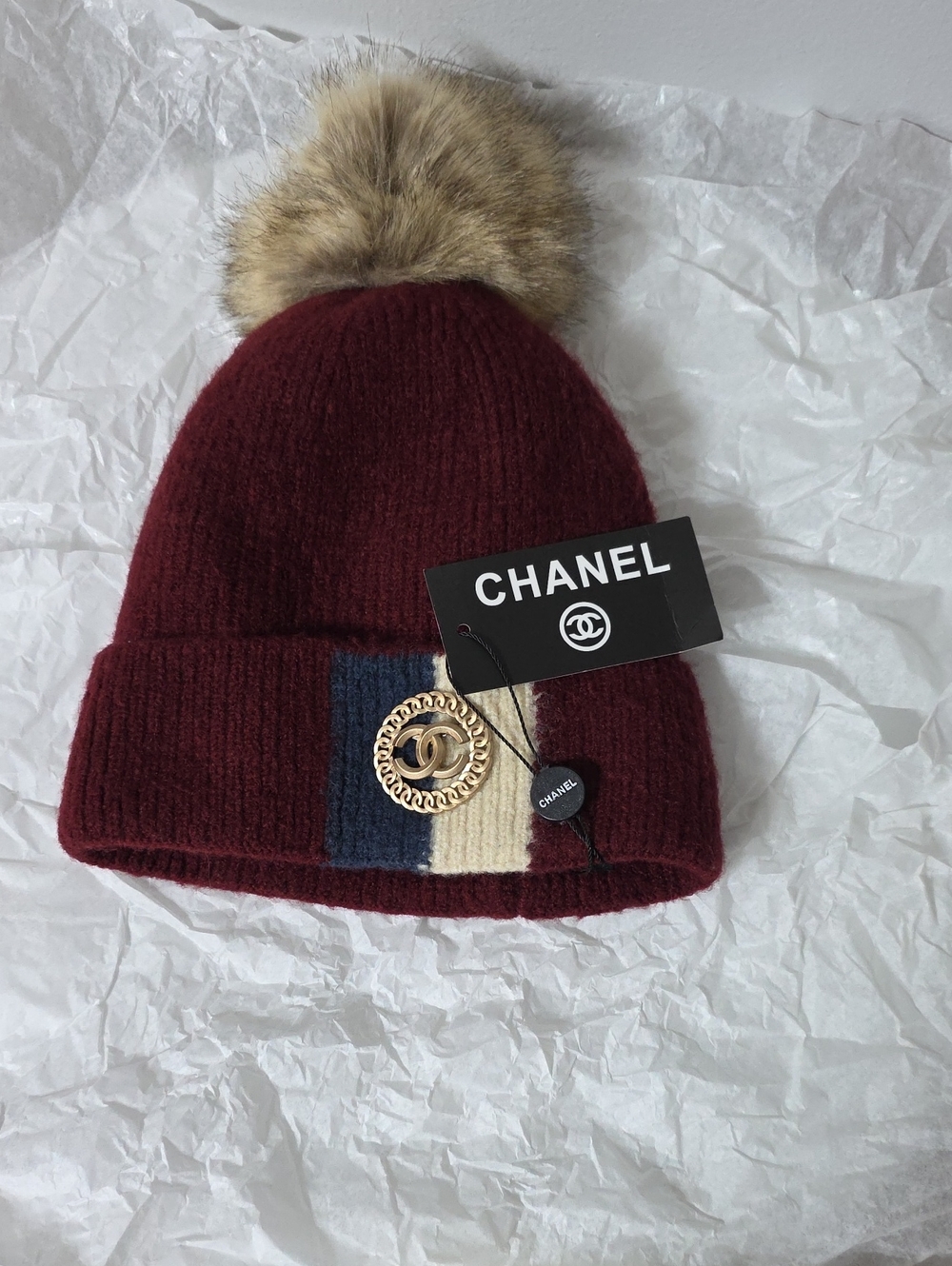 CHANEL Burgundy Knit Pom Pom Beanie with Gold CC Medallion and Tricolor Stripe